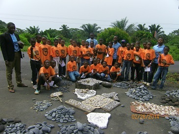 Remains of the Eruption1.Students of form one in a group picture with teachers